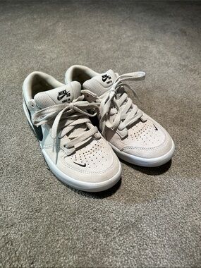 Nike Kids Suede Skate Sneakers in Light Beige with Black Swoosh
